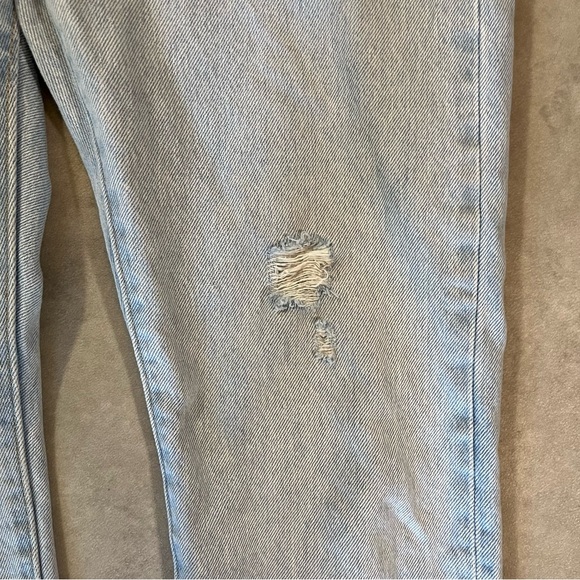 Levi's 501 Light Blue Denim Jeans. Button fly. Rips. Size 27. Leg 28. Like new - Picture 6 of 9